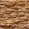 Flexible stone veneer in warm, earthy tones and rugged texture, perfect for adding a natural, cliff-like aesthetic to any interior wall or exterior facade.