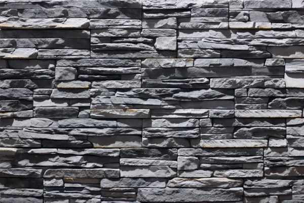 Ledge Stone 2 Ledge Stone wall cladding in grey offers a textured, natural look for interior walls, creating a decorative panel with a rugged, organic finish. Contact us!