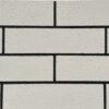 White split brick flexible stone veneer for interior walls, offering the look of traditional brick with easy installation and a lightweight design.