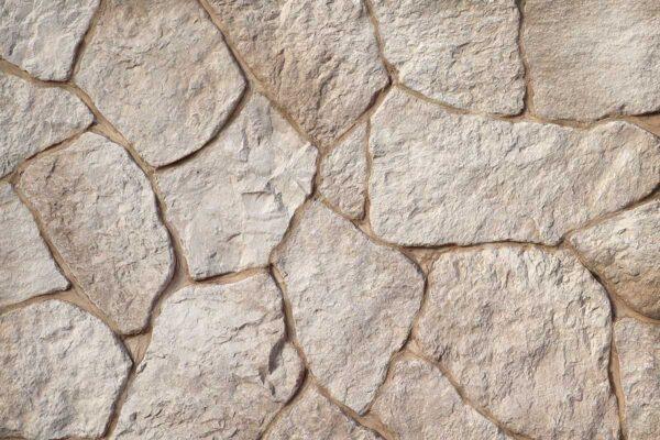 Field Stone 5 Flexible stone veneer in field stone style offers a natural, textured look ideal for an interior wall or exterior facade; contact us for durable wall cladding.