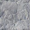 Achieve a natural look with flexible stone veneer in field stone style, showcasing a gray, textured pattern perfect for interior wall or exterior facade applications.