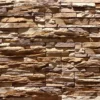 Flexible stone veneer in warm brown and tan tones with a rugged texture, ideal for an eye-catching interior wall or durable exterior facade.
