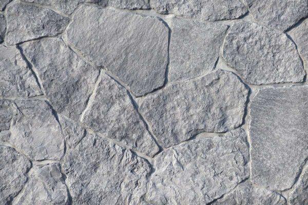 Field Stone 4 Achieve a natural look with flexible stone veneer in field stone style, showcasing a gray, textured pattern perfect for interior wall or exterior facade applications.
