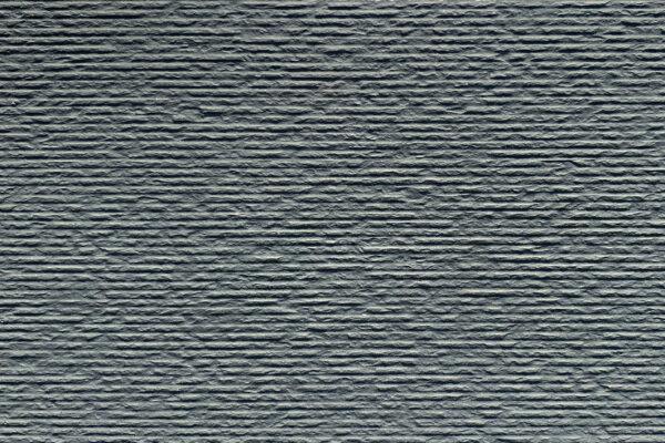 Cut Stone 4 Flexible stone veneer featuring a gray, horizontally-lined texture, ideal for modern interior walls or exterior facades. Contact us for durable wall cladding solutions.