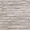 Muretto Stone flexible stone veneer featuring a light gray, textured brick-pattern mosaic, ideal for an interior wall or exterior facade.