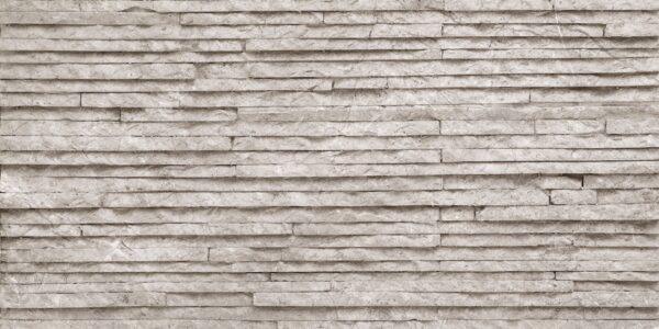 Muretto Stone flexible stone veneer featuring a light gray, textured brick-pattern mosaic, ideal for an interior wall or exterior facade.