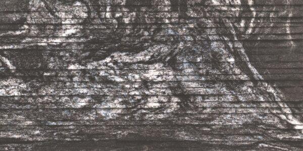 Muretto Stone flexible stone veneer features a unique brick-pattern mosaic with a textured, dark finish, perfect for interior walls or exterior facades.