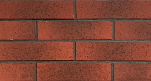 Split Brick 1 Split brick flexible stone veneer in a red hue with a textured surface, ideal for interior wall design or exterior facade applications.