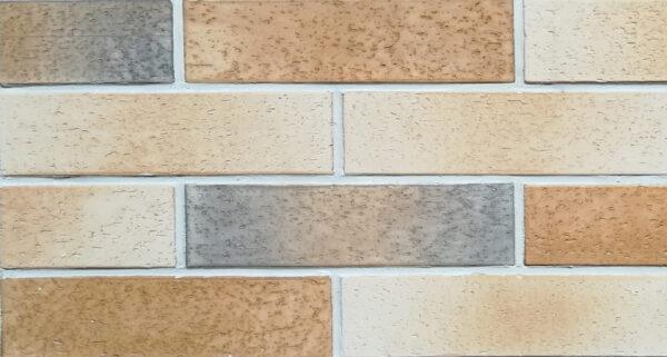 Split Brick 5 Split brick flexible stone veneer in shades of tan, gray, and cream with a textured finish, ideal for an interior wall cladding.