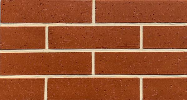 Split Brick 3 Enhance your space with Split Brick flexible stone veneer, featuring a textured reddish-brown finish perfect for any interior wall or exterior facade.