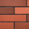 Split brick flexible stone veneer in rustic red tones, perfect for an interior wall or exterior facade with a classic brick appearance.