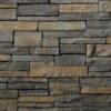 Flexible stone veneer in Skyline color with a country ledgestone pattern, ideal for interior walls and exterior facades, offering the timeless look of castle stone.