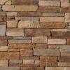 Flexible stone veneer featuring a country ledgestone pattern in Sevilla tones, perfect for adding a touch of rustic charm to any interior wall or exterior facade.