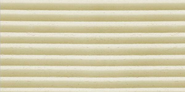 Flexible stone veneer in cream color with a ripple texture, ideal as lightweight wall cladding to bring a modern, textured look to any interior space.