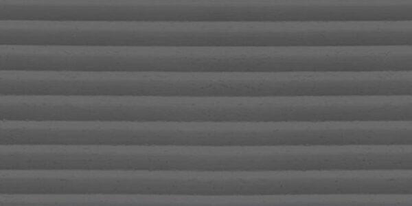Gray flexible stone veneer with a ripple texture, ideal for modern interior wall cladding and decorative panels, offering a lightweight construction material.
