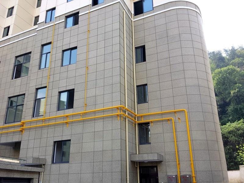 Hospital corridor with durable wall cladding